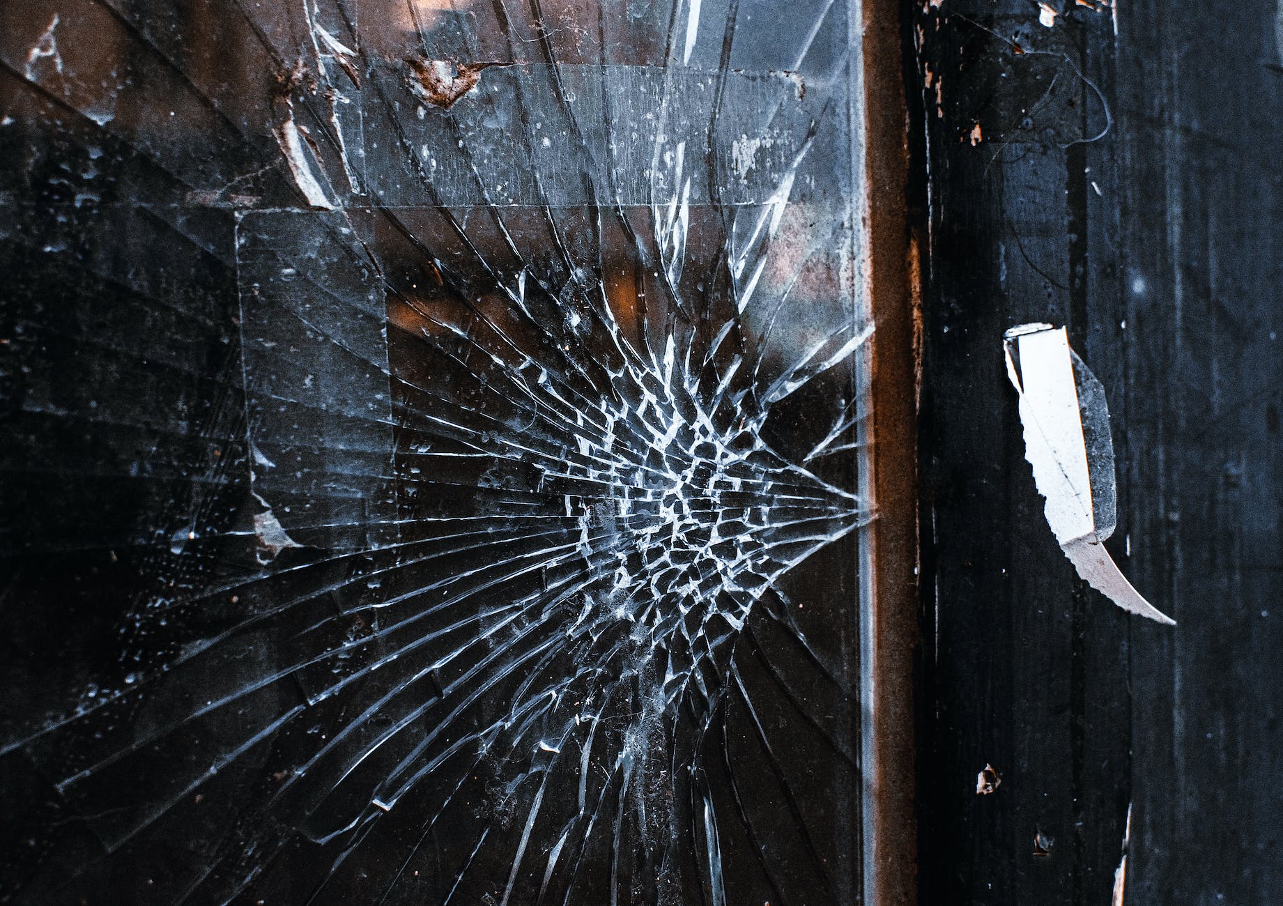 broken glass on wooden surface